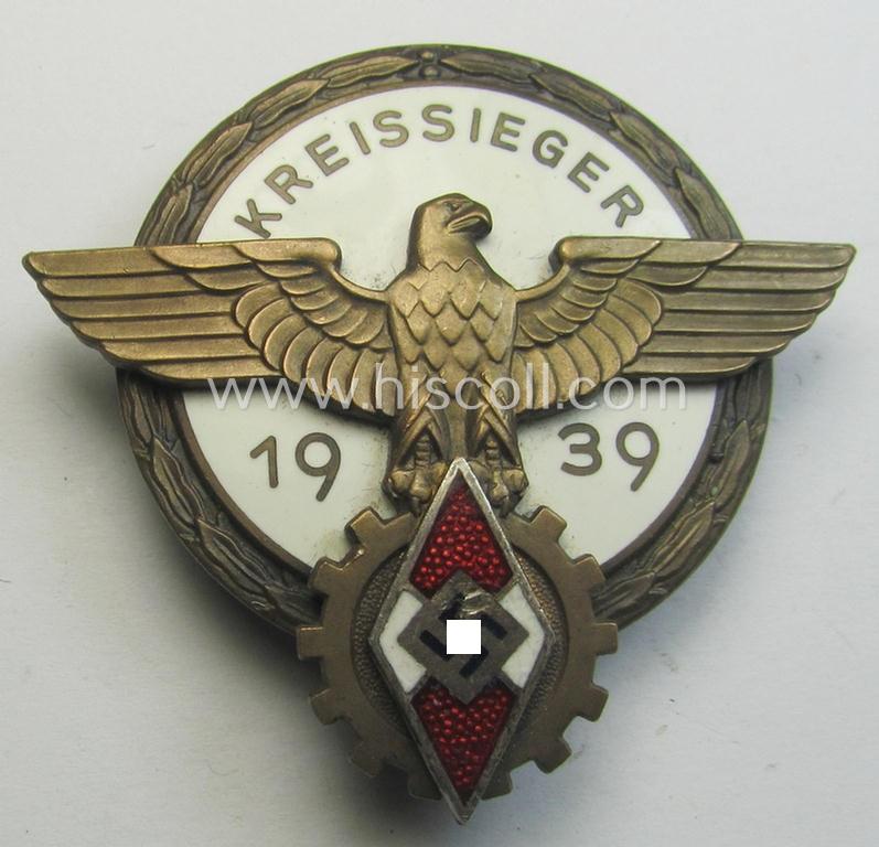 Superb, 'HJ'- ('Hitlerjugend') ie. 'BDM'- ('Bund Deutscher Mädel') related: 'Reichsberufswettkampf-Siegerabzeichen' (of the 2nd model) entitled: 'Kreissieger 1939' and being a neatly maker- (ie.: 'G. Brehmer'-) marked example