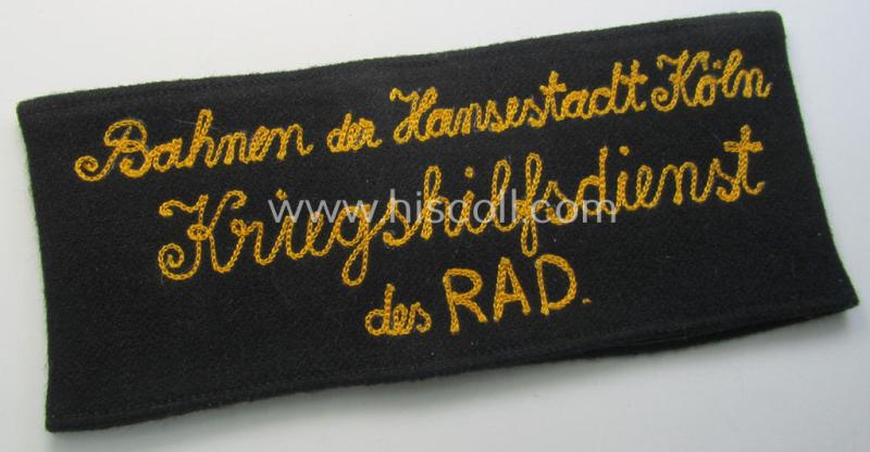 Superb - possibly unique and truly rarely found! - woolen-based, RAD (ie. 'Reichsarbeitsdienst') cuff-title (ie. 'Dienstärmelstreifen') depicting the text: 'Bahnen der Hansestadt Köln - Kriegshilfsdienst des RAD'