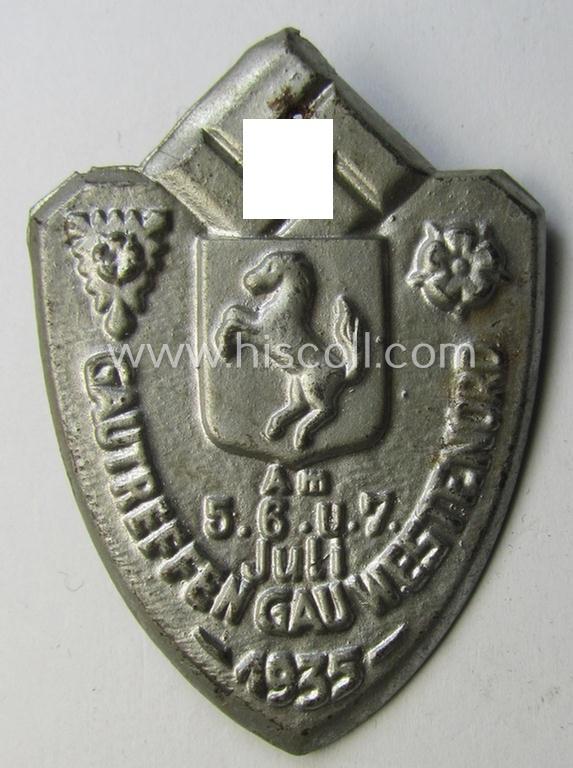 Attractive, silver-toned- (and I deem typical 'Eisenblech'-based) so-called: N.S.D.A.P.-related day-badge (ie. 'tinnie' or: 'Veranstaltungsabzeichen') as was issued to commemorate the: 'Gautreffen - Gau Westf.-Nord - 5.-, 6.- u. 7. Juli 1935'