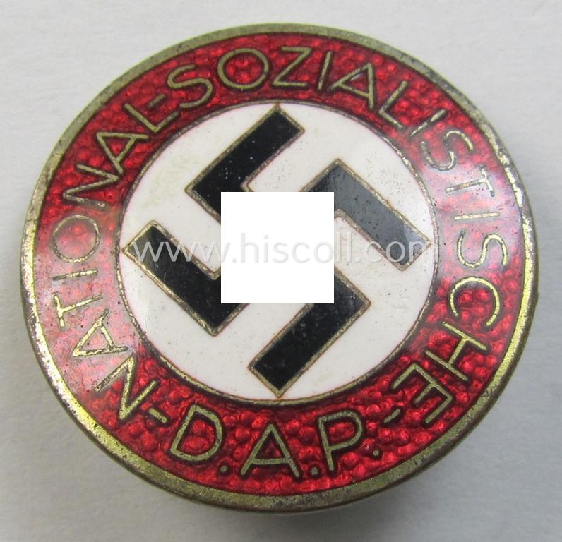 Attractive - bright-red-coloured and nicely preserved! - 'N.S.D.A.P.'-membership-pin- ie. party-badge (or: 'Parteiabzeichen') which is maker-marked on its back with the makers'-designation: 'RzM' and/or: 'M1/15'