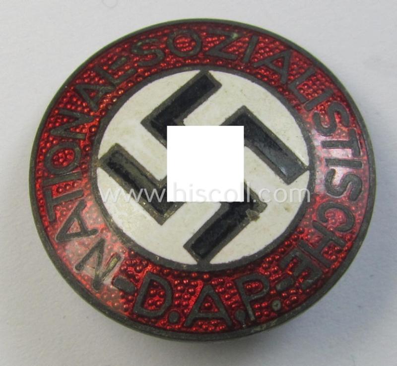 Attractive - bright-red-coloured and nicely preserved! - 'N.S.D.A.P.'-membership-pin- ie. party-badge (or: 'Parteiabzeichen') which is maker-marked on its back with the makers'-designation: 'RzM' and/or: 'M1/93'