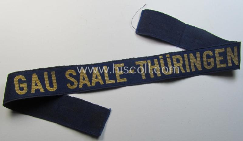 Attractive, bluish-coloured- and typical linnen-based 'Der Stahlhelmbund' (ie. 'Der Stahlhelm' - Bund der Frontsoldaten (or: Sta)' cuff-title (ie. 'Ärmelstreifen') entitled: 'Gau Saale-Thüringen'