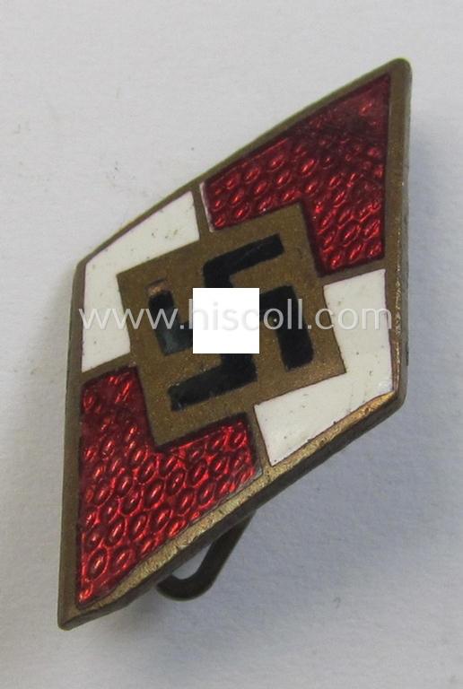 Moderately worn - early period! - HJ (ie. 'Hitlerjugend') enamelled lapel-pin (ie.: 'Raute') being a bright-red-coloured- and/or detailed - and non-cleaned and untouched! - example showing a (dual): 'Ges.Gesch.'-patent-pending-designation