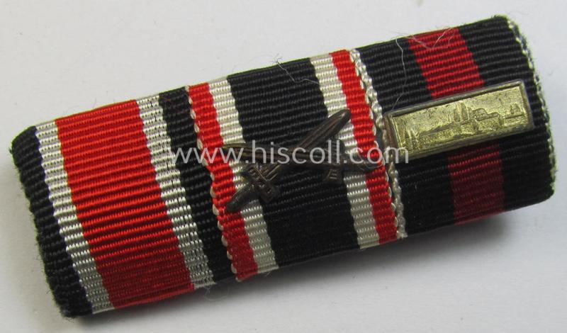 Attractive, three-pieced WH (Heeres etc.) ribbon-bar (ie. 'Band- o. Feldspange') that is showing the ribbons for an: 'EK II.Kl.', a: 'KvK II.Kl. mit Schw.' and a Czech 'Anschluss'-medal (and showing a detailed miniature 'Prager Burg-Spange')