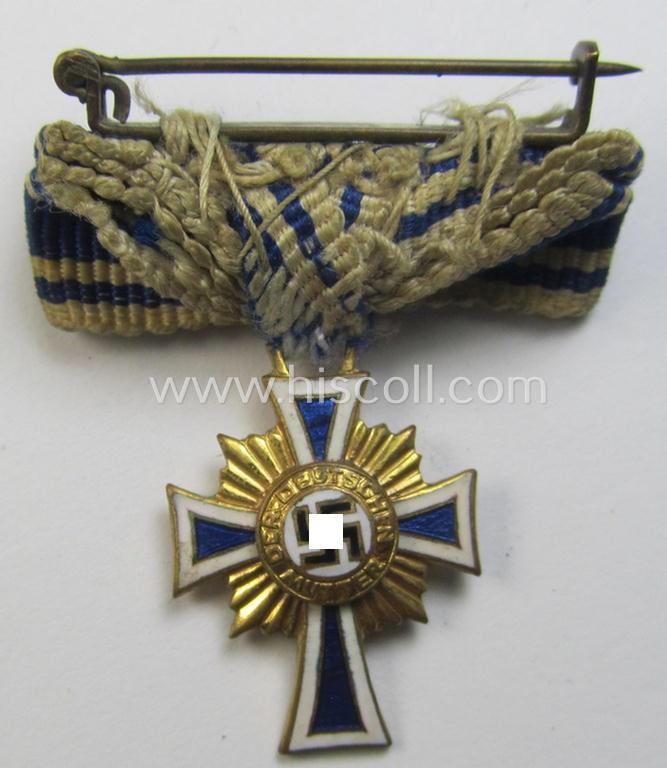 Miniature of an: 'Ehrenkreuz der deutschen Mutter - erste Stufe' (or: golden-class mothers'-cross) being a non-maker-marked example that comes in an overall nice- (albeit moderately worn- ie. used-), condition