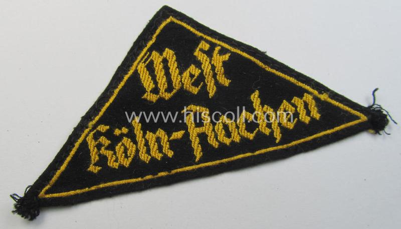 Neat - just moderately used- and/or clearly tunic- ie. shirt-removed! - example of a: 'HJ' ('Hitlerjugend') district-triangle (ie. 'Gebietsdreieck') entitled: 'West Köln-Aachen' (being an untouched example that misses its 'RzM'-etiket)