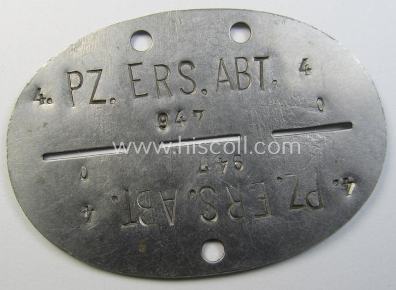 Superb - and scarcely found! - typical stainless-steel-based, WH (Heeres-) ie. 'Panzer'-related ID-disc (ie. 'Erkennungsmarke') bearing the clearly stamped unit-designation that reads: '4./Pz.Ers.Abt.4' and that comes as issued