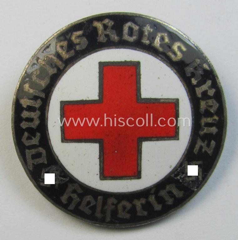 Attractive - and just moderately used! - example of a DRK (ie. 'Deutsches Rotes Kreuz' or German Red Cross) nurses'-badge as was intended for a: 'Helferin' being a maker- (ie. 'H.A.'-) marked example that comes in a fully untouched condition