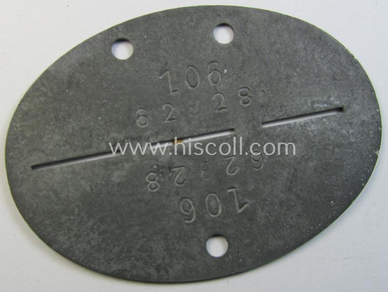 Zinc-based, WH (LW) ie. 'Fallschirmjäger/Flieger'-related ID-disc, bearing the clearly stamped- and/or: 'coded'-unit- ie. 'MOB'-designation that reads: '62828' (and as such belonging to the: 'Stab I./LL-Geschwader 1'