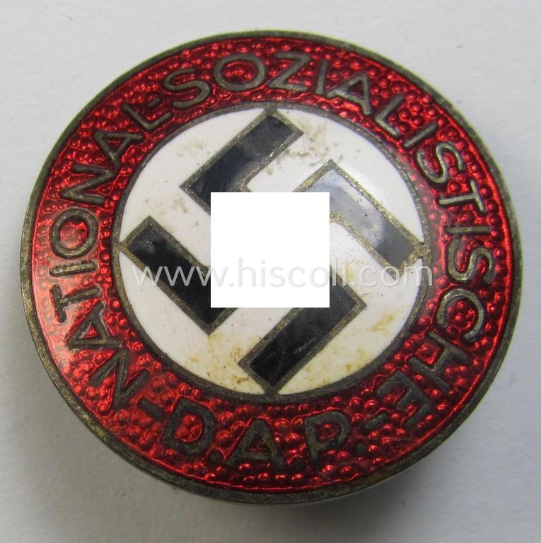 Attractive - bright-red-coloured and nicely preserved! - 'N.S.D.A.P.'-membership-pin- ie. party-badge (or: 'Parteiabzeichen') which is maker-marked on its back with the makers'-designation: 'RzM' and/or: 'M1/72'