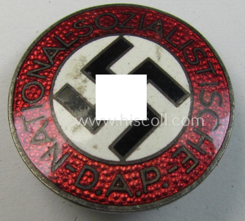 Attractive - bright-red-coloured and nicely preserved! - 'N.S.D.A.P.'-membership-pin- ie. party-badge (or: 'Parteiabzeichen') which is maker-marked on its back with the makers'-designation: 'RzM' and/or: 'M1/34'