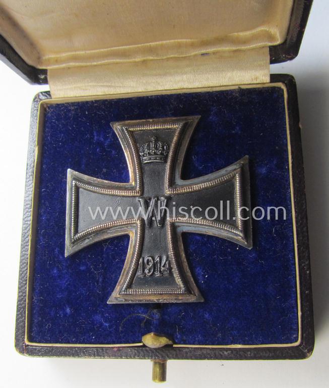 Attractive, WWI-period Iron Cross 1st class (or: 'Eisernes Kreuz 1. Klasse') being a typical non-converse-shaped example that shows the makers'-designation: 'KO' stamped onto its back and that came in its period etui as issued