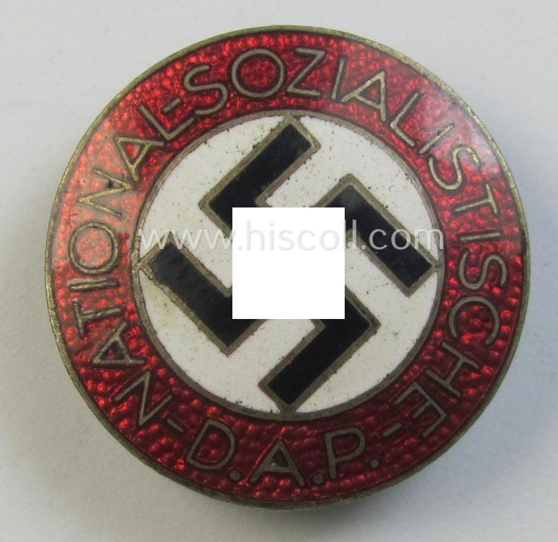 Neatly enamelled- (and bright-red-coloured!) 'N.S.D.A.P.'-membership-pin- ie. party-badge (or: 'Parteiabzeichen') which is nicely maker-marked on the back with the makers'-designation: 'RzM' and/or: 'M1/34'