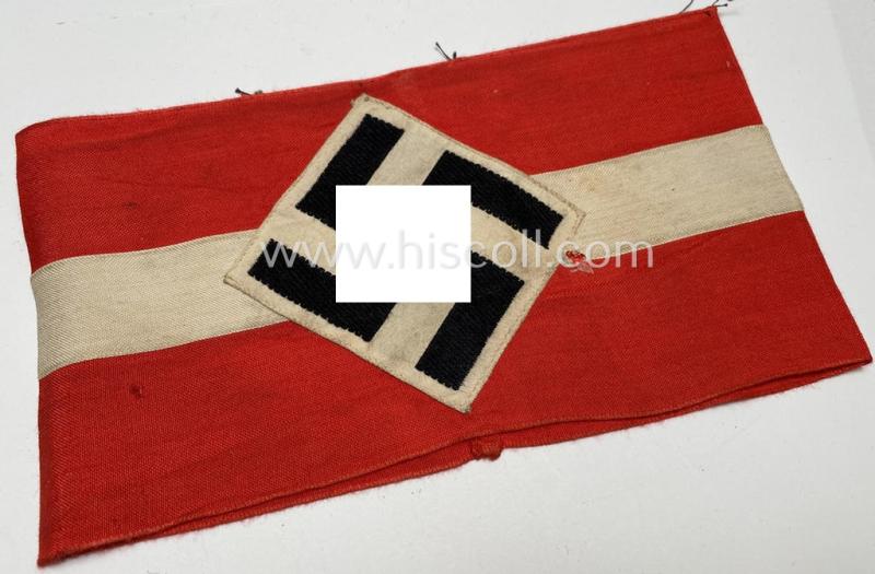 Attractive - and scarcely found! - 'standard'- (ie. entirely woven) pattern, bright-red-coloured HJ- (ie. 'Hitlerjugend'-) related armband (ie. 'Armbinde') being a moderately worn- ie. used example that still retains its 'RzM'-etiket