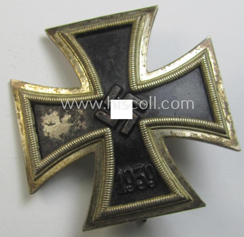 'Eisernes Kreuz 1. Klasse' (or: Iron Cross 1st class) being a fairly early-period- and/or clearly maker- (ie. '26'-) marked example by the maker: 'B.H. Mayers' Kunstprägeanstalt' that comes as issued and/or moderately used