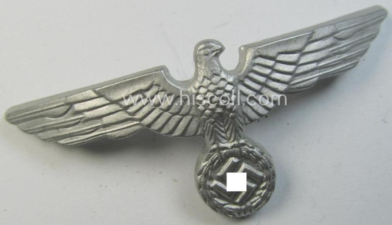 Neat, WH (Heeres) bright-silver-toned (ie. aluminium-based), EM- (ie. NCO- or officers') type visor-cap-eagle being a maker- (ie. 'G.B.'-) marked and/or: '1938'-dated example that comes in a just minimally used- ie. once cap-attached-, condition