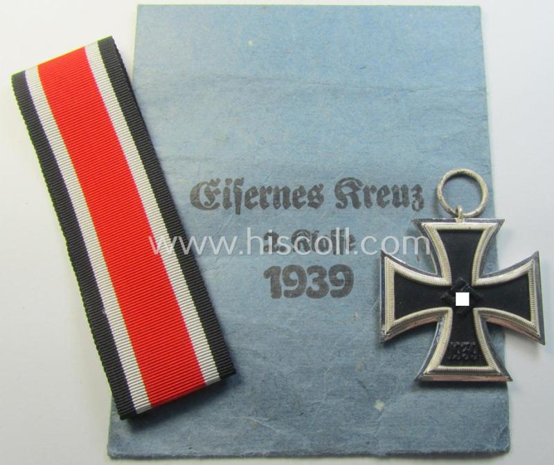 Superb - and 'virtually mint'! - 'Eisernes Kreuz 2. Kl.' (ie. Iron Cross 2nd Class) being a non-maker-marked example that comes stored in its period 'Zellstoff'-based pouch as was produced by the: 'Gustav Brehmer'-company