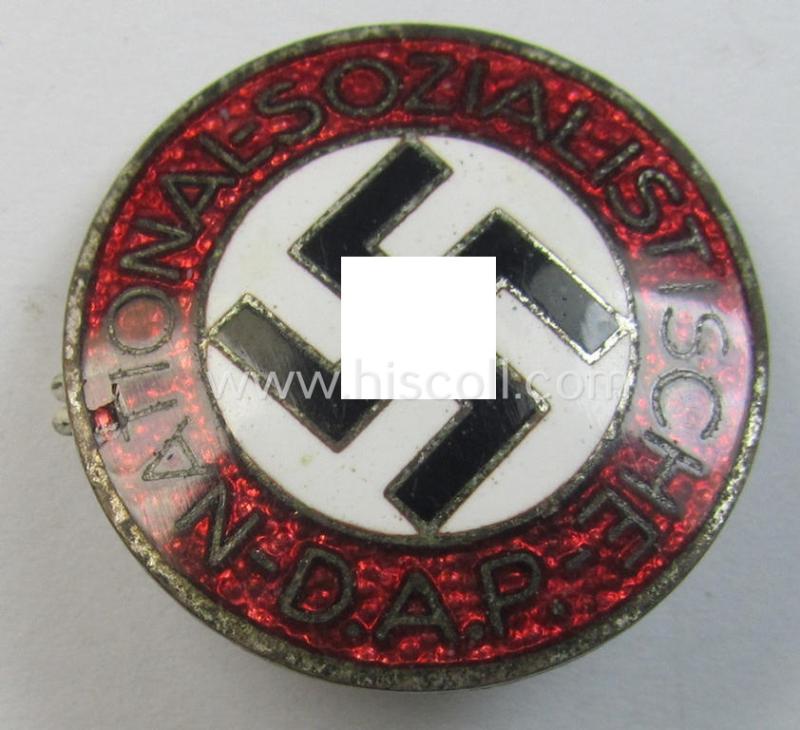 Attractive - bright-red-coloured and nicely preserved! - 'N.S.D.A.P.'-membership-pin- ie. party-badge (or: 'Parteiabzeichen') which is maker-marked on its back with the makers'-designation: 'RzM' and/or: 'M1/105'