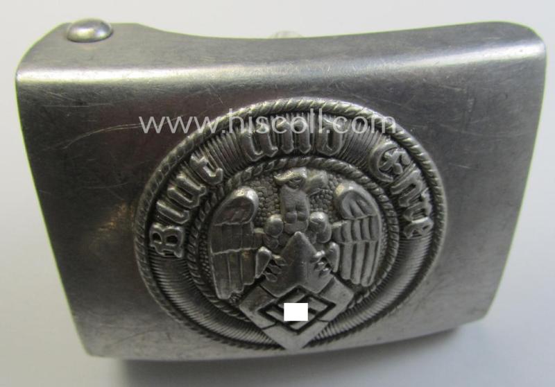 Attractive, HJ (ie. 'Hitlerjugend') matted silver-coloured- (ie. aluminium-based- and/or 'molded'-pattern) belt-buckle being a neatly maker- (ie. 'RzM M4/46'-) marked example that comes in a just moderately used- ie. worn, condition