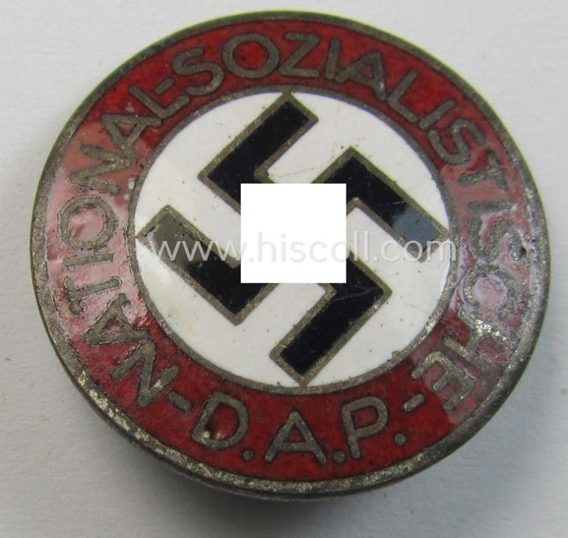 Attractive - bright-red-coloured and nicely preserved! - 'N.S.D.A.P.'-membership-pin- ie. party-badge (or: 'Parteiabzeichen') which is maker-marked on its back with the makers'-designation: 'RzM' and/or: 'M1/14'