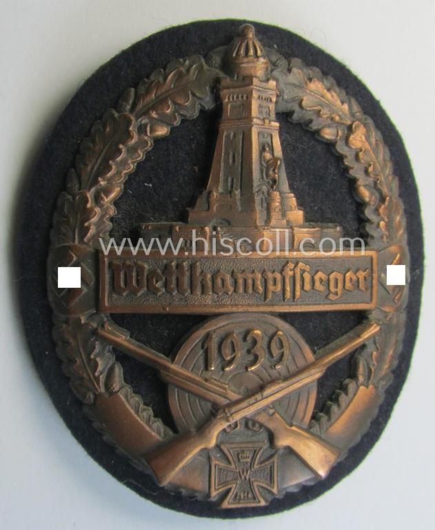 Attractive, bronze-toned (and I deem 'Cupal'-based!) 'Kyfhäuserbund Schiessauszeichnung' depicting the 'Kyfhäuser'-monument and double 'swastika'-devices and bearing the text that reads: 'Wettkampfsieger 1939'