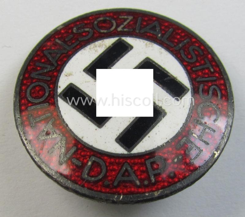 Attractive - bright-red-coloured and nicely preserved! - 'N.S.D.A.P.'-membership-pin- ie. party-badge (or: 'Parteiabzeichen') which is maker-marked on its back with the makers'-designation: 'RzM' and/or: 'M1/101'
