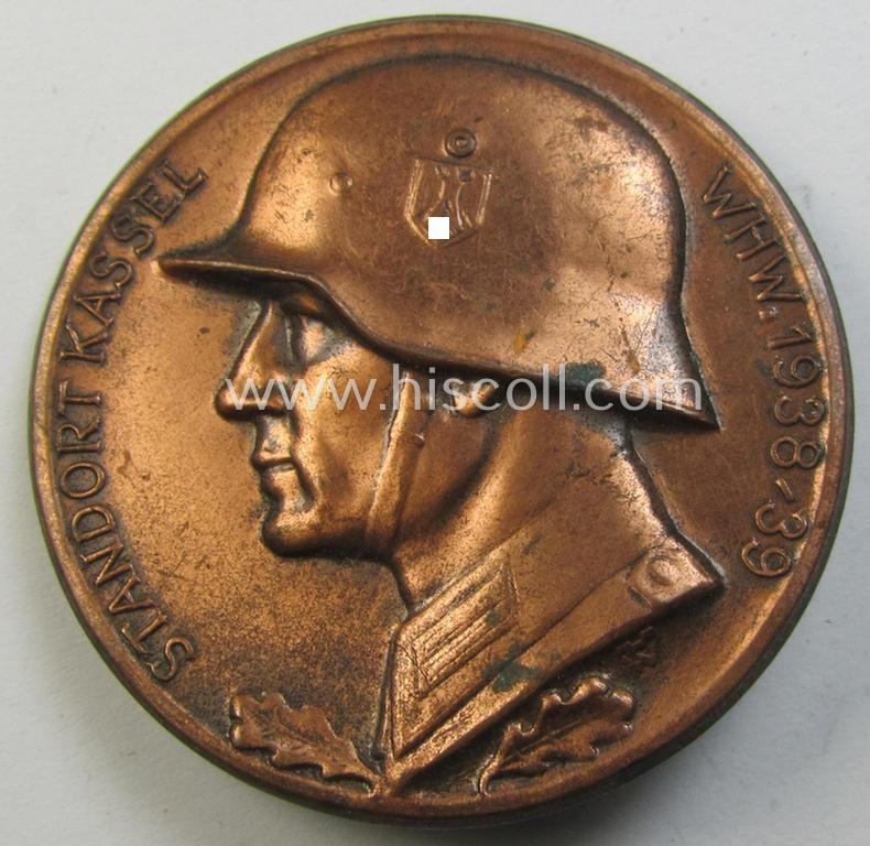 Attractive - and unusally seen! - reddish-bronze-toned and W.H.W.- (ie. 'Winterhilfswerke'-) related day-badge (ie. 'tinnie') as was issued to commemorate a: 'WHW'-gathering ie. rally entitled: 'Standort Kassel - WHW 1938/39'