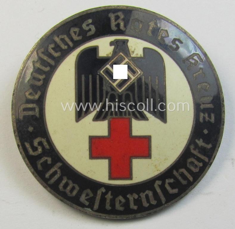 Superb, DRK (ie. 'Deutsches Rotes Kreuz') so-called: nurses'-badge entitled: 'Schwesternschaft' being a medium-sized version showing an engraved bearers'-number: ('5208') and/or makers'-mark (that reads 'PC' in a 'Raute')