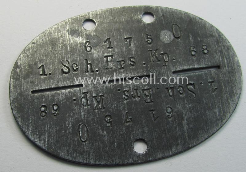 Attractive, zinc-based WH (Heeres) ie. 'Schützen'-related ID-disc (ie. 'Erkennungsmarke') bearing the clearly stamped unit-designation that reads: '1.Sch.Ers.Kp. 68' and that comes as issued- and/or worn