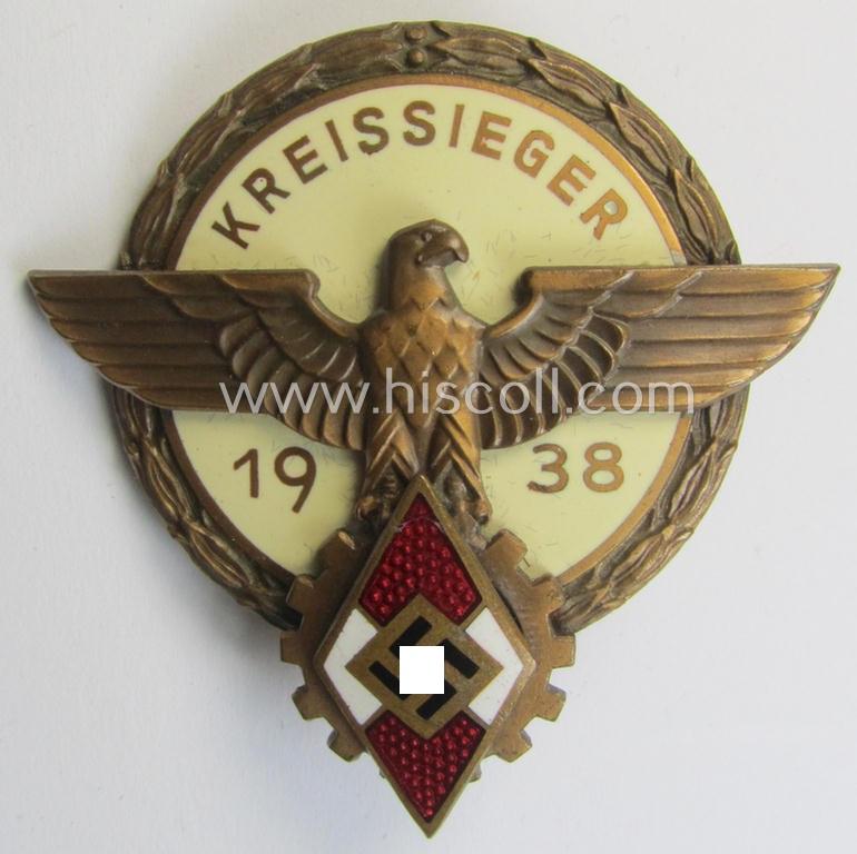 Attractive, 'HJ'- ('Hitlerjugend') ie. 'BDM'- ('Bund Deutscher Mädel') related: 'Reichsberufswettkampf-Siegerabzeichen' (of the 2nd model) entitled: 'Kreissieger 1938' and being a neatly maker- (ie.: 'G. Brehmer'-) marked example