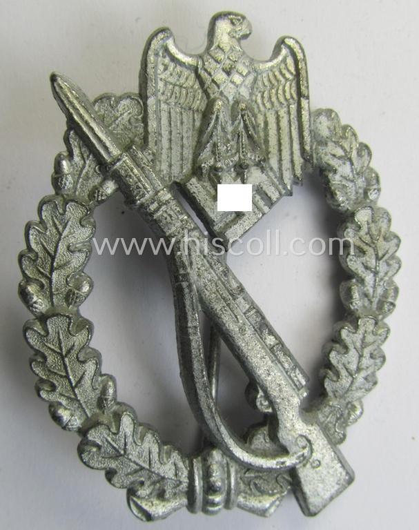 Attractive, 'Infanterie Sturmabzeichen in Silber' (or: silver-class infantry assault badge ie. IAB) being a detailed albeit unmarked example (of the 'long-barrel-hinge'-variant) as executed in 'Feinzink' as was produced by the: 'Steinhauer & Lück'