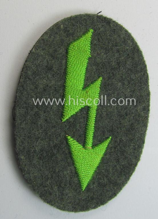 Attractive, WH (Heeres) trade- and/or special-career-insignia ie. hand-embroidered 'signal-blitz' as executed in bright-green linnen on field-grey-toned wool as was specifically intended for a soldier within the: 'Pz.-Gren.Truppen'