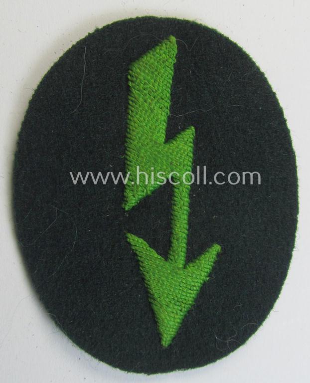 Attractive, WH (Heeres) trade- and/or special-career-insignia ie. hand-embroidered 'signal-blitz' as executed in bright-green linnen on darker-green-toned wool as was specifically intended for a soldier within the: 'Pz.-Gren.Truppen'