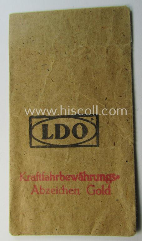 Neat - albeit regrettably empty! - 'Zellstoff'-based- and/or 'LDO'-marked pouch as was intended to store a WH (Heeres, Luftwaffe, Waffen-SS etc.) so-called: 'Kraftfahrbewährungs-Abzeichen in Gold' (or: drivers' proficiency-badge in gold)