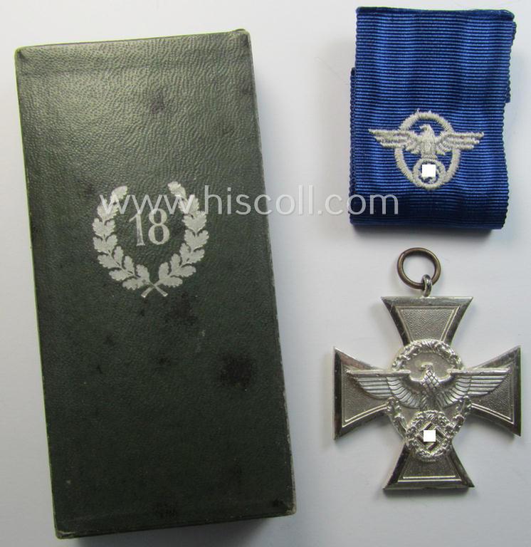 Attractive, bright-silver-toned 'Polizei-D.A. 2. Stufe' (or: police loyal-service medal 2nd class) that came together with its period (& long-sized) ribbon (ie. 'Bandabschnitt') and that comes stored in its scarcely seen, green-coloured etui