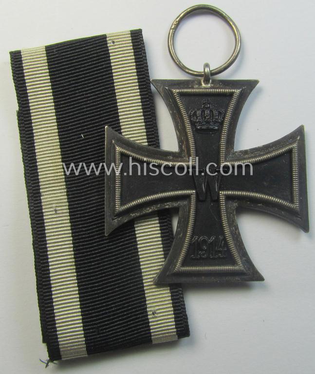 Attractive, WWI-period: 'Eisernes Kreuz II. Klasse' (or: iron cross second class) being a typical maker-marked example that comes together with its (minimally) confectioned but long-sized piece of ribbon (ie. 'Bandabschnitt')