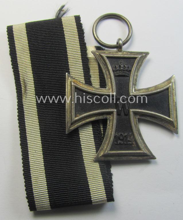 Attractive, WWI-period: 'Eisernes Kreuz II. Klasse' (or: iron cross second class) being a typical maker-marked example that comes together with its (minimally) confectioned but long-sized piece of ribbon (ie. 'Bandabschnitt')