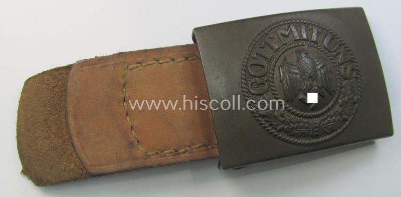 Superb, WH (Heeres) field-grey-coloured- and/or steel-based belt-buckle, being a maker- (ie. 'Rodo'-) marked example that comes mounted on its (non-marked) leather-based tab and that comes in a minimally used- ie. worn-, condition