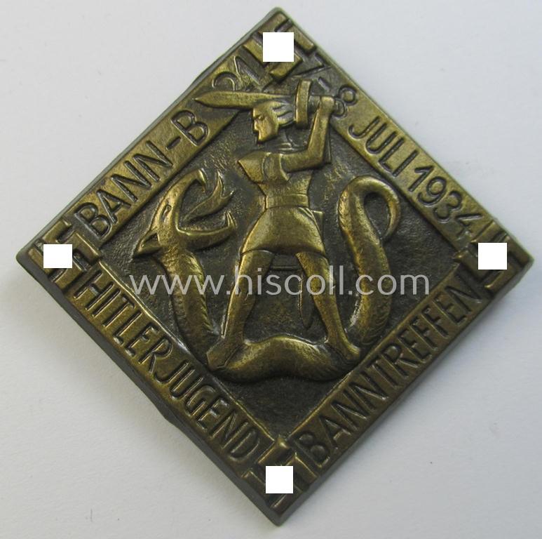 Attractive - and early-period! - HJ ('Hitlerjugend') related 'tinnie' being a bronze-toned- albeit non-maker-marked example that is showing a knight fighting a snake and text that reads: 'Hitlerjugend - Banntreffen - Bann B 21 - 7.-8. Juli 1934'