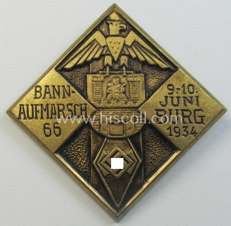 Attractive - and scarcely encountered! - HJ- (ie.'Hitlerjugend') related 'tinnie' being a golden-bronze-toned- and typical non-maker-marked example showing the text: 'Bann-Aufmarsch 66 - 9.10. Juni - Burg - 1934'