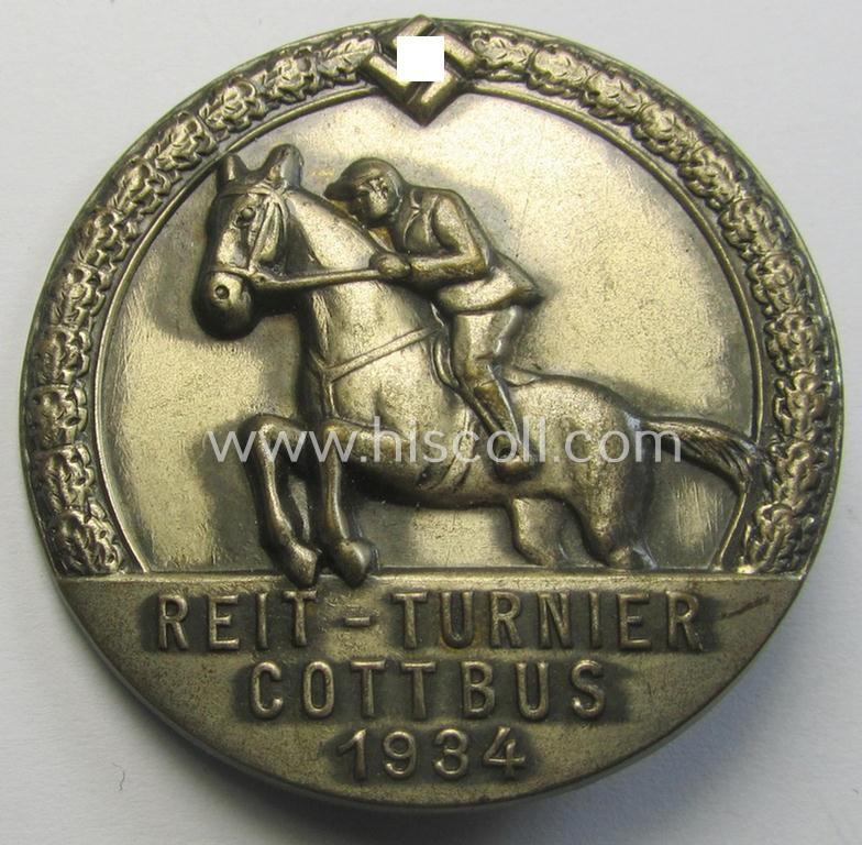 Attractive - and unusally seen! - silverish-toned and/or: sports'- (ie. 'Reiter'-) related day-badge (ie. 'tinnie') as was issued to commemorate a locally-held: 'Reiter'-gathering entitled: 'Reit-Turnier - Cottbus - 1934'