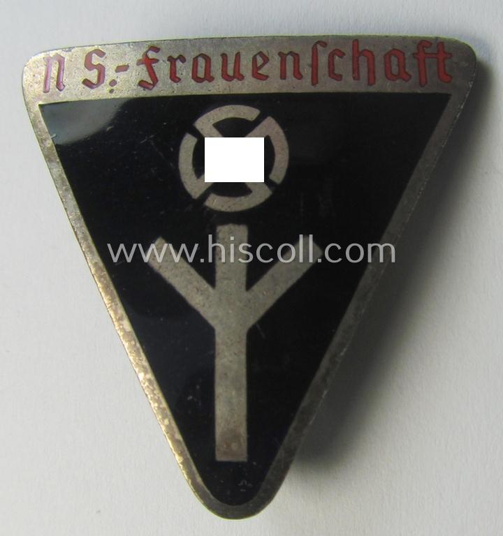 Detailed and neatly enamelled 'NS-Frauenschaft'-membership-badge (ie. 'Mitgliedsabzeichen') being a (typical) 3-cms.-sized example of the eight pattern that shows an: 'RzM M1/34'-designation on its back