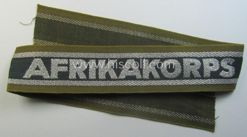 Superb, 'BeVo'-like cuff-title (ie. 'Ärmelstreifen') entitled: 'Afrikakorps' being a presumably issued but simply never worn example that comes in an overall very nice- (ie. non-shortened- and never tunic-attached-), condition