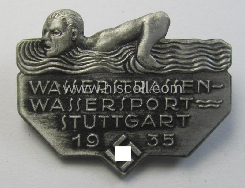Attractive, silverish-toned and/or: sports'- (ie. 'Schwimmen'-) related day-badge (ie. 'tinnie') as was issued to commemorate a locally-held: 'Wassersport'-gathering entitled: 'Wasserstrassen-Wassersport - Stuttgart - 1935'