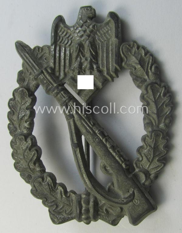 Attractive - surely worn but truly detailed! - 'Infanterie Sturmabzeichen in Silber' (or: silver-class infantry assault-badge ie. IAB) being a maker- (ie. 'HA'- ie. 'Hermann Aurich') marked example as executed in zinc-based metal (ie. 'Feinzink')