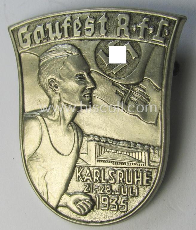 Attractive, silverish-toned and/or: sports'- (ie. 'Athletics'-) related day-badge (ie. 'tinnie') as was issued to commemorate a locally-held: 'Athletics'-competition entitled: 'Gaufest R.f.L. - Karlsruhe - 21.-28. Juli 1935'