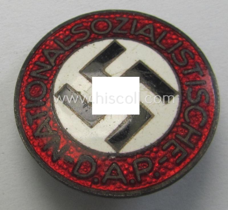 Neat - bright-red-coloured and nicely preserved! - 'N.S.D.A.P.'-membership-pin- ie. party-badge (or: 'Parteiabzeichen') which is maker-marked on its back with the makers'-designation: 'RzM' and/or: 'M1/52'