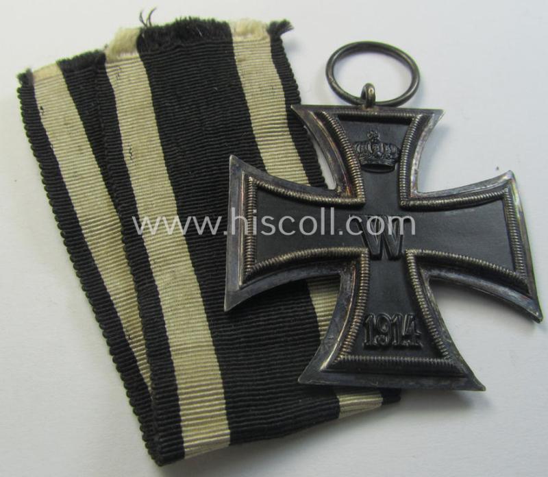 Attractive, WWI-period: 'Eisernes Kreuz II. Klasse' (or: iron cross second class) being a typical maker-marked example that comes together with its (minimally) confectioned but long-sized piece of ribbon (ie. 'Bandabschnitt')