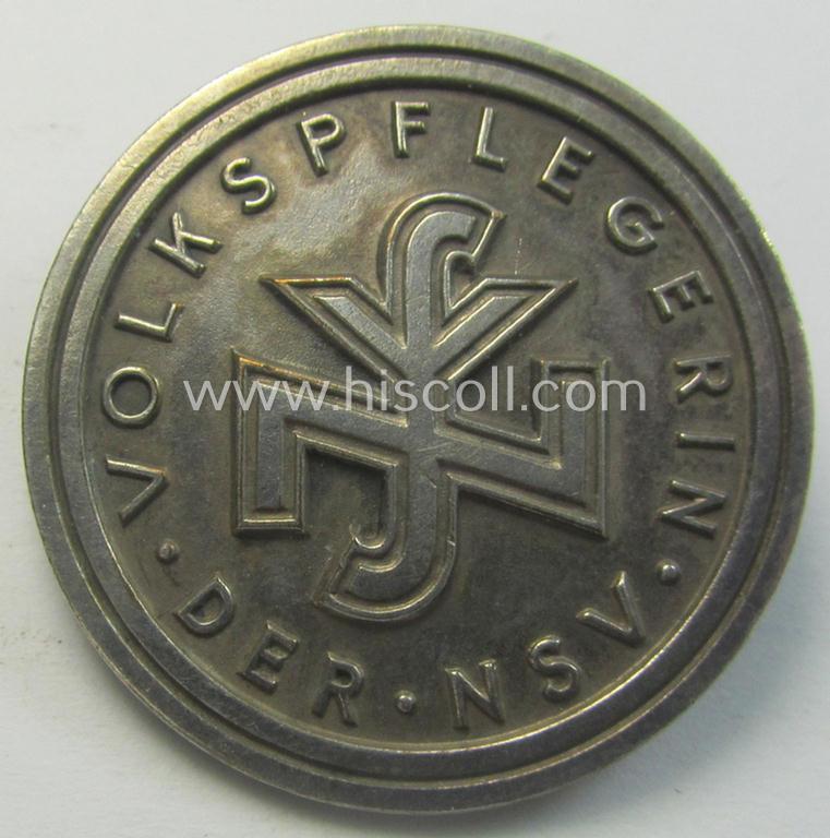 Superb - and never before seen! - so-called: N.S.V. (ie. 'Nat.Soc.Volkswohlfahrt') membership-lapel-pin being a maker- (ie. 'Hoffstätter - Bonn'-) marked example depicting the text: 'Volksplegerin der NSV'