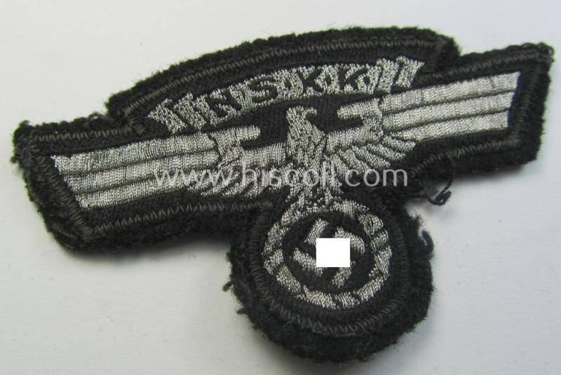 Attractive, so-called: N.S.K.K. (ie. 'National Socialistisches Kraftfahr Korps') arm-eagle as executed in so-called: flatwire, 'BeVo'-weave pattern and comes mounted onto a black-coloured background